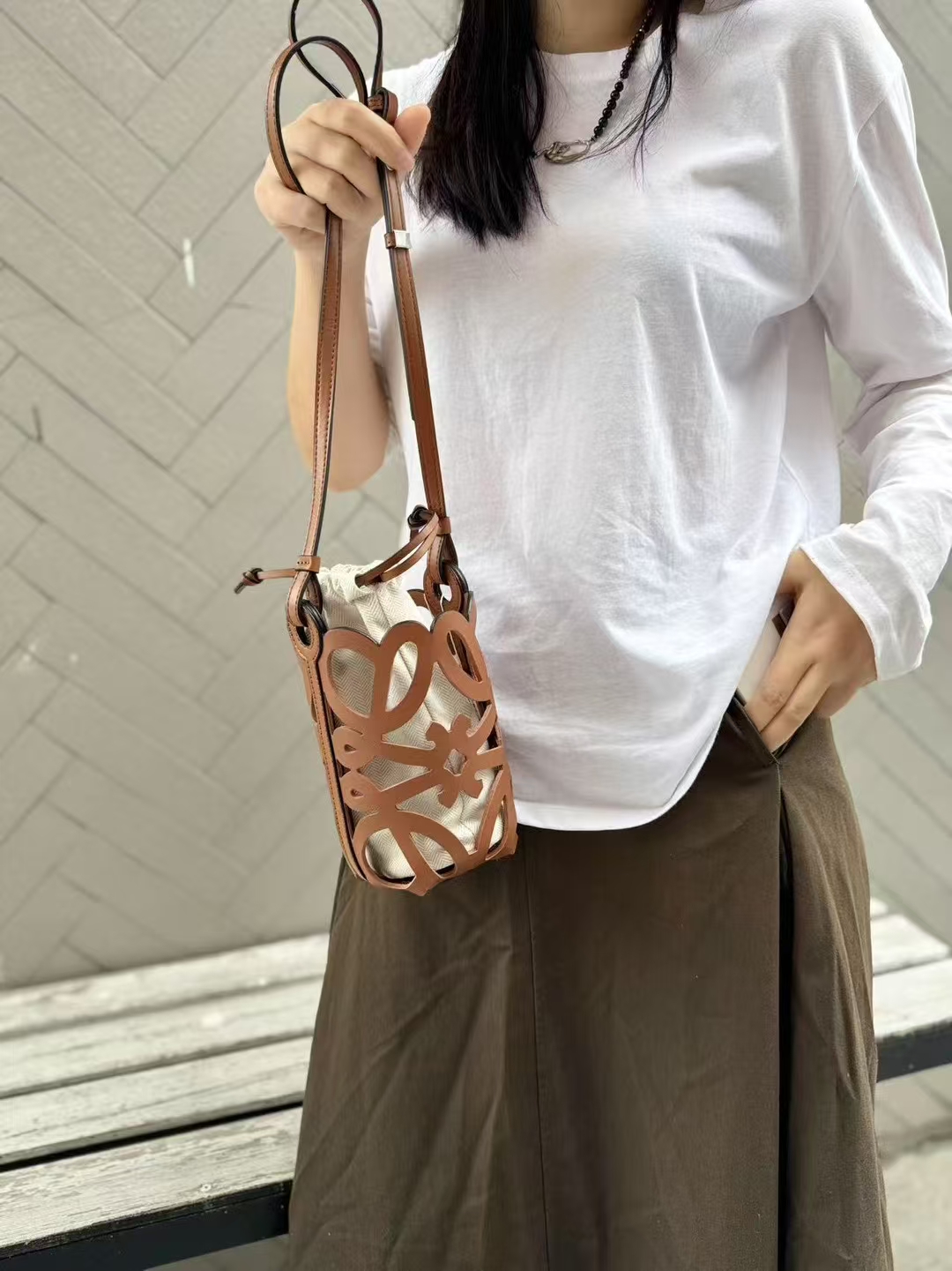Top-Grain Cowhide Hollow-Out Drawstring genuine leather Phone Bag mini shoulder bag crossbody bag