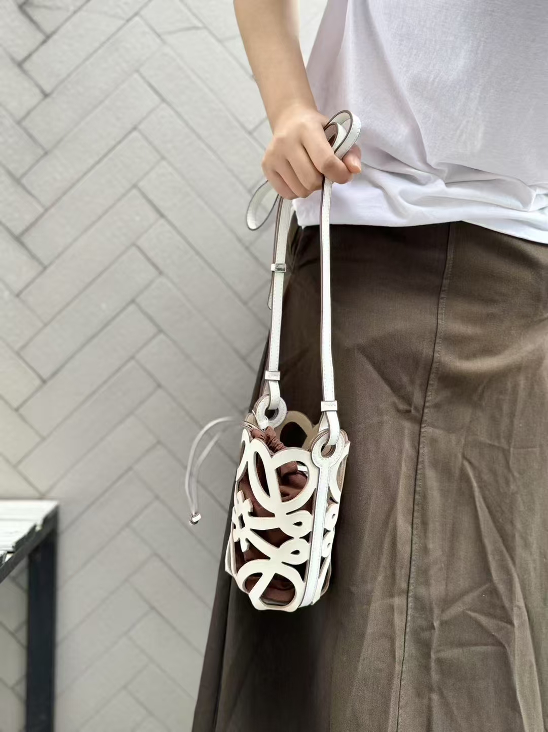 Top-Grain Cowhide Hollow-Out Drawstring genuine leather Phone Bag mini shoulder bag crossbody bag